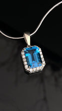 Load and play video in Gallery viewer, Blue Topaz Diamond Pendant
